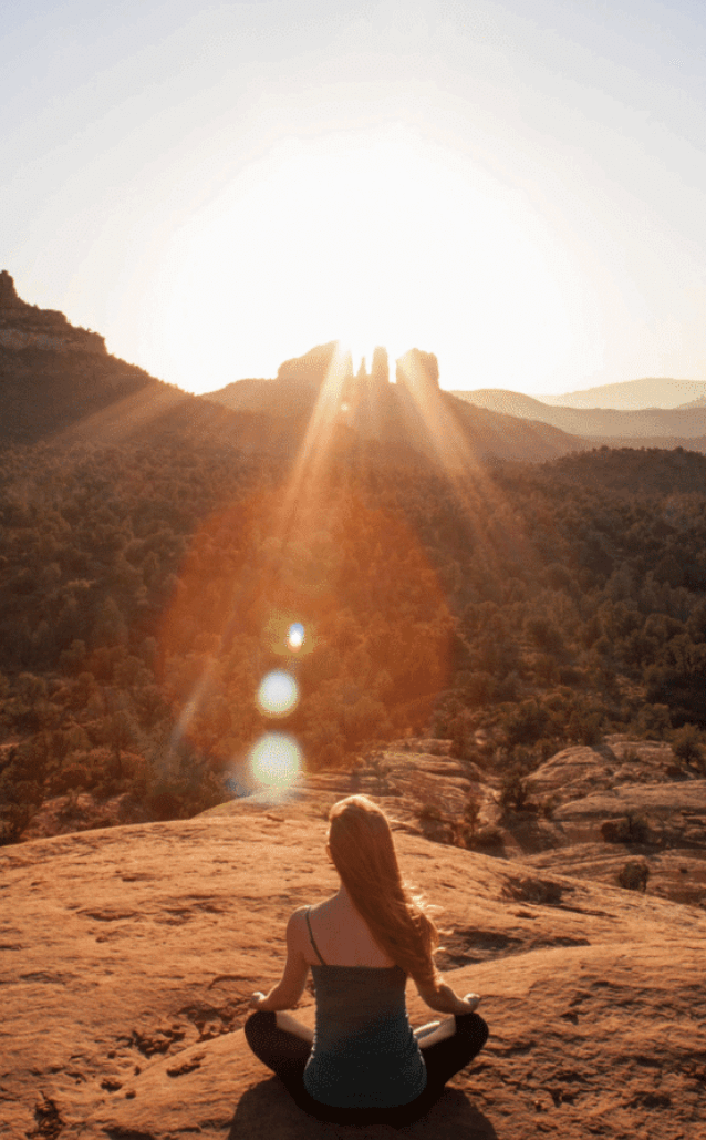 meditating in the sedona vortex energy A woman meditating in the Sedona vortex energy.